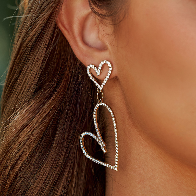 Pendientes encantadores exquisitos de corazón de aleación para mujer