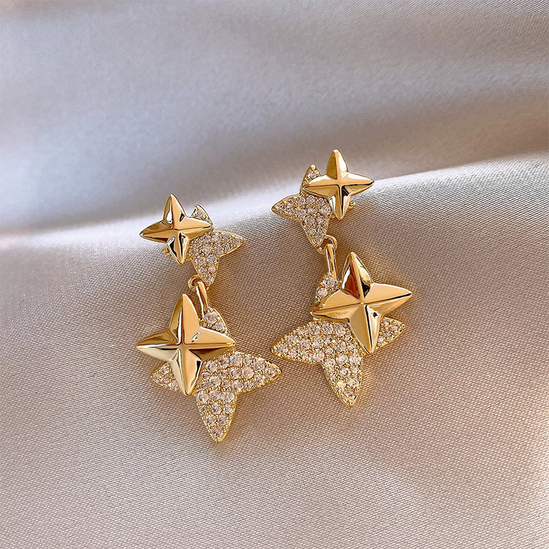 Pendientes atractivos en forma de estrella de aleación con strass para mujer
